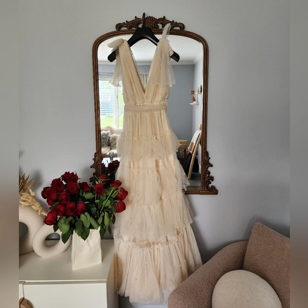 Ivorie Kai size medium